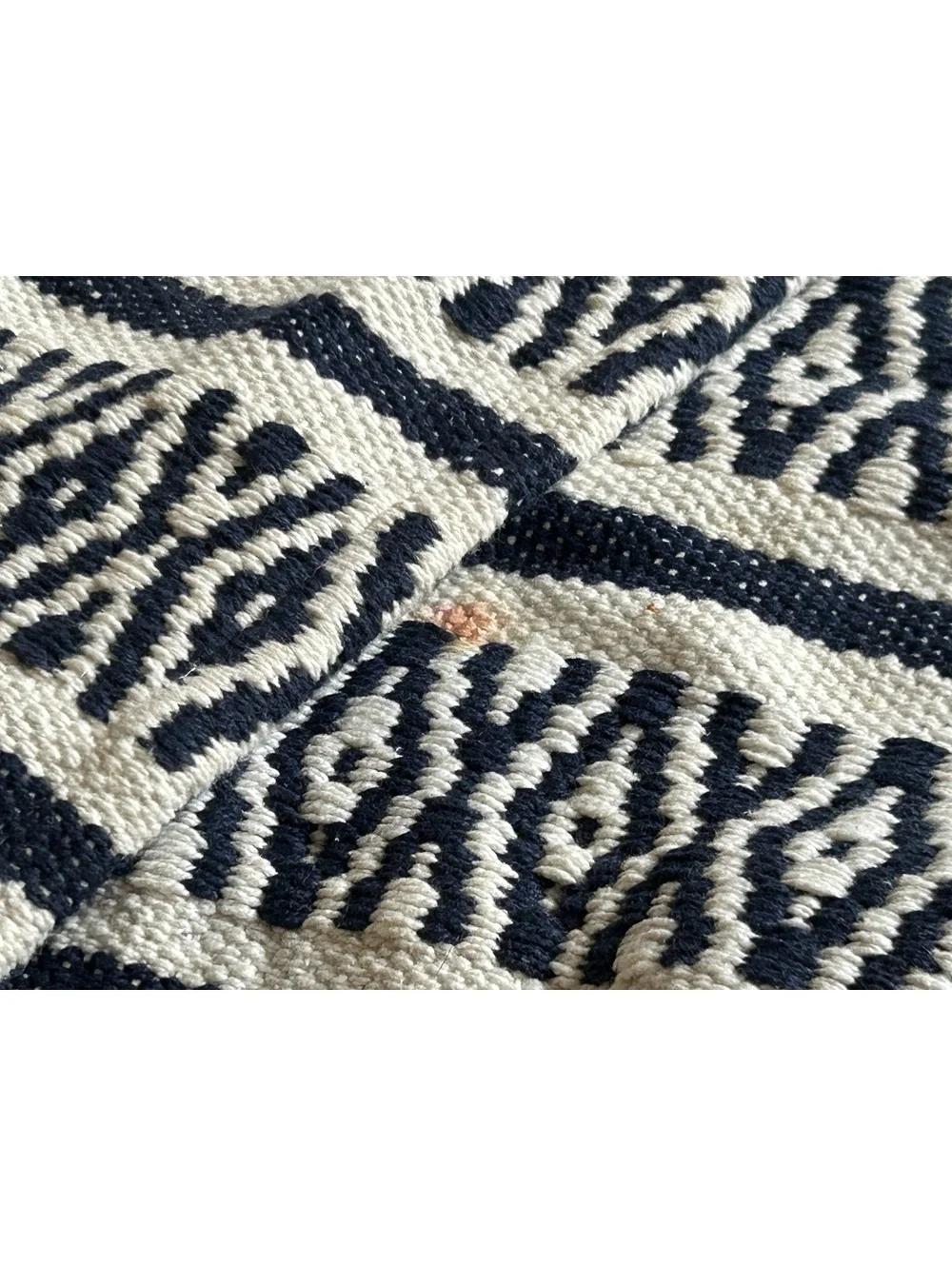 Handwoven Black and White Patterned Table Runner with Tassels